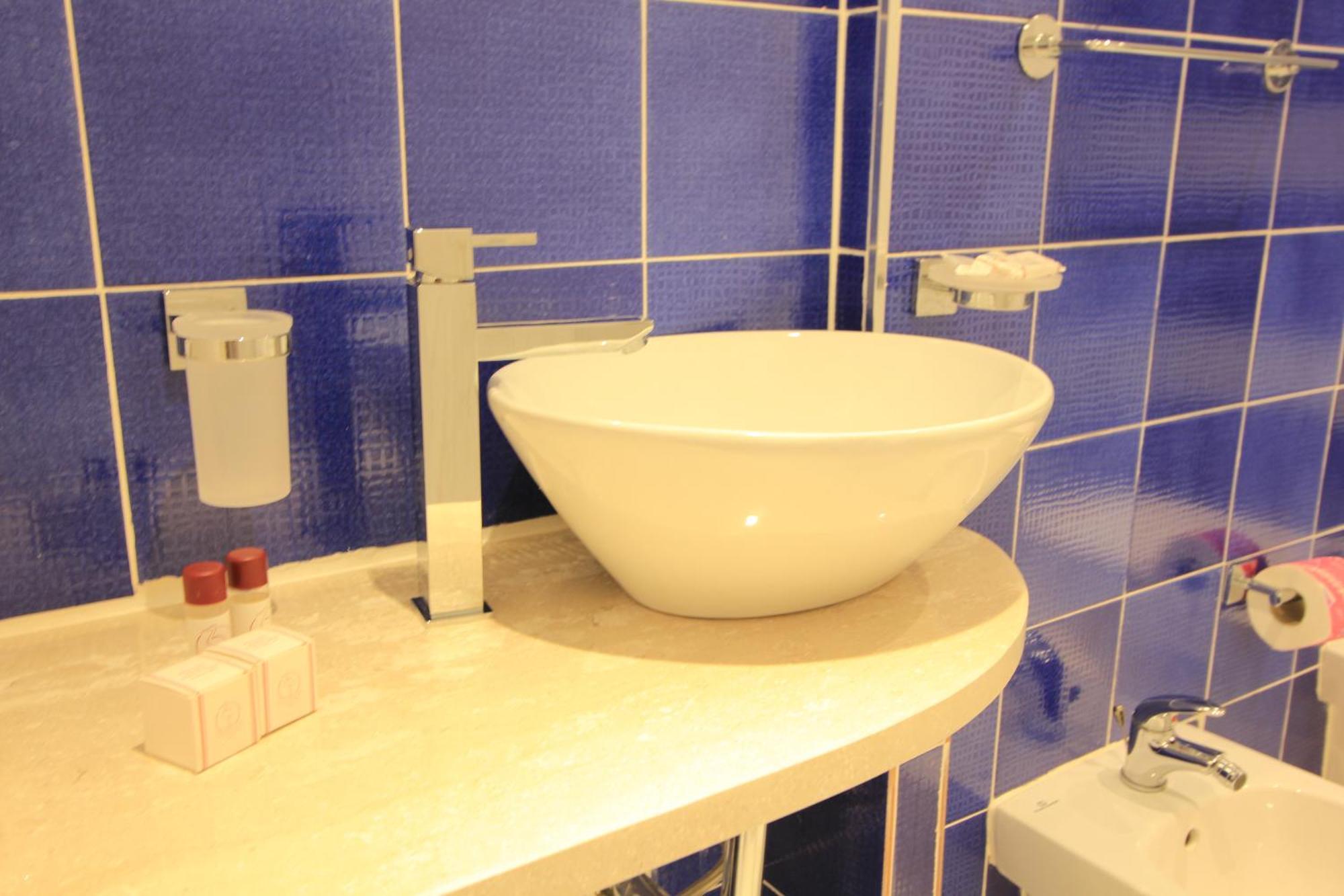 B&B Vitruvio Suites Формия Стая снимка